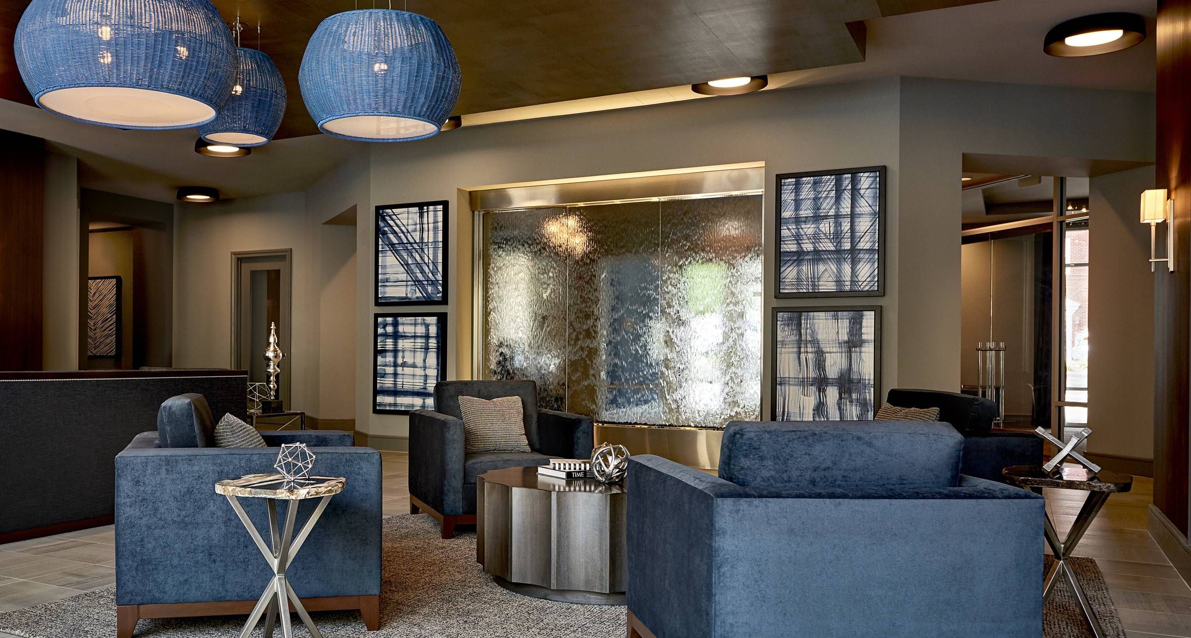 Evolution at Towne Center Laurel upscale clubhouse lounge area with seating and modern decor.